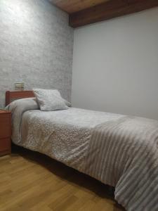 Cama o camas de una habitación en Casa Rural La Maestra