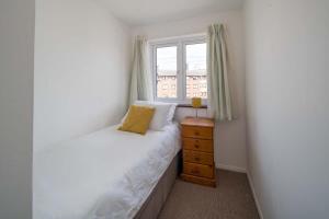 Postel nebo postele na pokoji v ubytování Harbour View