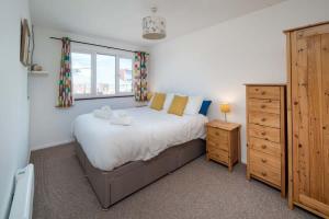 Postel nebo postele na pokoji v ubytování Harbour View