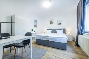 Postel nebo postele na pokoji v ubytování 3-Zi - 6 Personen - Zentral-Bielefeld - kostenloser Parkplatz