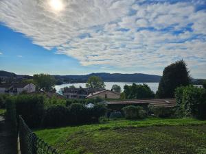 a view of the lake from the backyard of a house at Il Riposo del Viaggiatore by Holiday World in Ternate