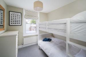 Postel nebo postele na pokoji v ubytování Riggers Rest