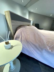Ένα ή περισσότερα κρεβάτια σε δωμάτιο στο Duplex cosy à Carnot