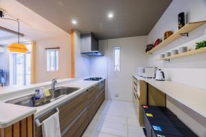 Cucina o angolo cottura di House FORMOSA中島