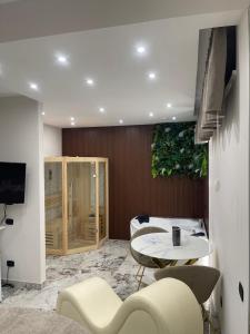 TV a/nebo společenská místnost v ubytování Hotel Manuela