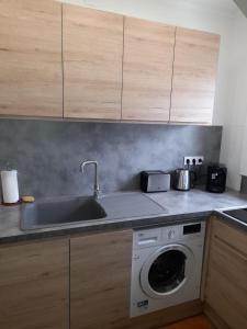 Kuchyň nebo kuchyňský kout v ubytování Casita con jardín cerca playa AV-60