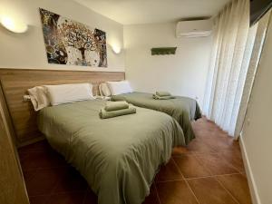 Postel nebo postele na pokoji v ubytování APARTAMENTO EN EL CENTRO CERCA DE La PLAYA
