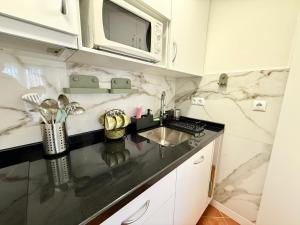 Kuchyň nebo kuchyňský kout v ubytování APARTAMENTO EN EL CENTRO CERCA DE La PLAYA