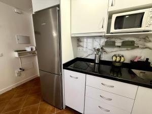 Kuchyň nebo kuchyňský kout v ubytování APARTAMENTO EN EL CENTRO CERCA DE La PLAYA