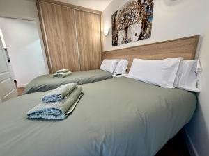 Postel nebo postele na pokoji v ubytování APARTAMENTO EN EL CENTRO CERCA DE La PLAYA