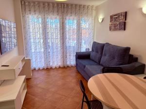 Posezení v ubytování APARTAMENTO EN EL CENTRO CERCA DE La PLAYA