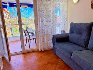 Posezení v ubytování APARTAMENTO EN EL CENTRO CERCA DE La PLAYA