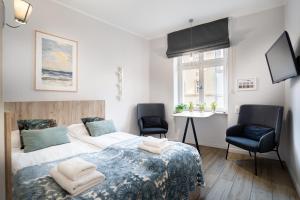 Posteľ alebo postele v izbe v ubytovaní Aparthotel przy Bulwarze by Rentoom