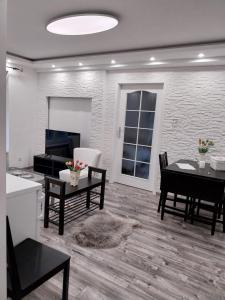 TV a/nebo společenská místnost v ubytování Rozinka apartman + 5 fotografií
