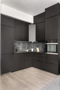 Dapur atau dapur kecil di Modern & Bright Apartment in Central Oslo