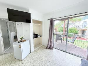 Kuchyň nebo kuchyňský kout v ubytování Emu Park Beach Resort