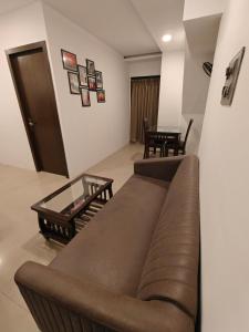 Χώρος καθιστικού στο Garden View Terrace 1 BHK in Sanpada, Navi Mumbai