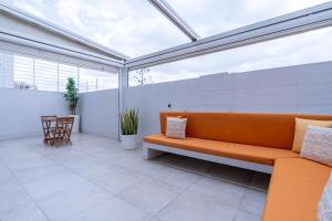 Ruang duduk di Studio Cosy avec Piscine et Terrasse