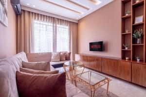 Ruang duduk di Studio Cosy avec Piscine et Terrasse +21 gambar