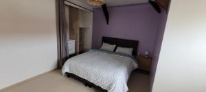 Letto o letti in una camera di Omaha beach vue les Braves