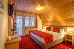 Postel nebo postele na pokoji v ubytování Landhotel Bartlehof