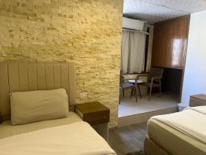 Postel nebo postele na pokoji v ubytování cairo jordan hotel