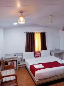 Postel nebo postele na pokoji v ubytování Hotel Gir Scintilla