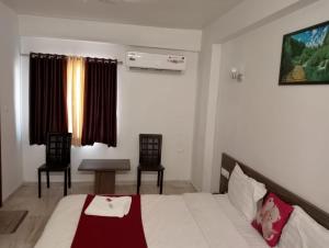 Hotel Gir Scintilla客房内的一张或多张床位