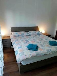 A bed or beds in a room at Gorizia Central Luxe Apartment 6 posti letto