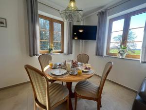 TV a/nebo společenská místnost v ubytování Gästehaus Eicherhof + 14 fotografií