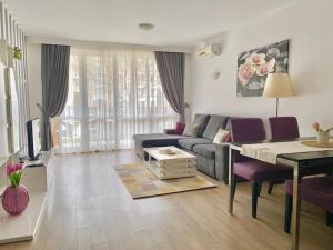 A seating area at Apartments in complex ATIA RESORT