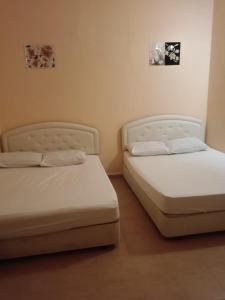 Postel nebo postele na pokoji v ubytování Wonderful Motel