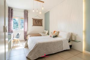 Postel nebo postele na pokoji v ubytování BARI ROOMS Suite Station