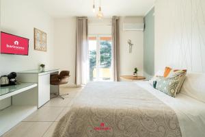 Postel nebo postele na pokoji v ubytování BARI ROOMS Suite Station
