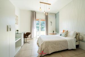 Postel nebo postele na pokoji v ubytování BARI ROOMS Suite Station + 27 fotografií