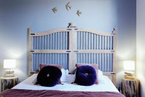 En eller flere senge i et værelse på Fréjus plage: appartement cosy à 300m de la mer