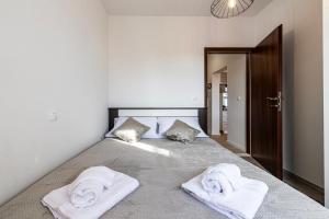 Postel nebo postele na pokoji v ubytování Lumari Dubrovnik Apartment