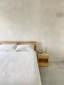 Postel nebo postele na pokoji v ubytování Olea b&b