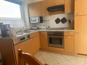 Kuchyň nebo kuchyňský kout v ubytování Ferienwohnung-West