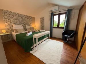 Postel nebo postele na pokoji v ubytování La Casa Del Ju Lya 4 étoiles