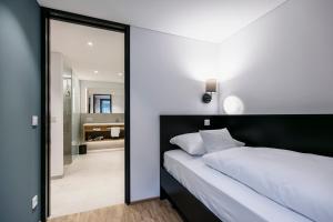 Letto o letti in una camera di Montfort - das Hotel