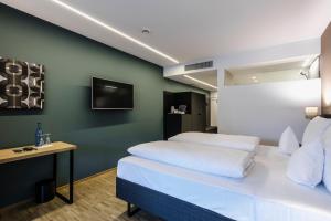 TV o dispositivi per l'intrattenimento presso Montfort - das Hotel