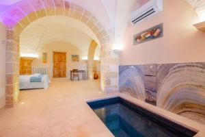 A seating area at Villa Luritu Luxury Pool Tricase by HDSalento
