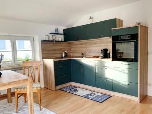 Η κουζίνα ή μικρή κουζίνα στο Prestige-Apartment-Chiemsee