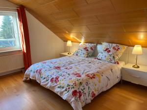 En eller flere senge i et værelse på Rebstock