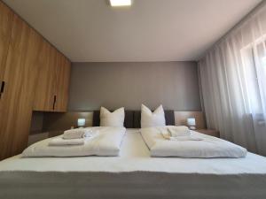 Katil atau katil-katil dalam bilik di Zartenbach Suite Two +9 gambar