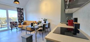 Posezení v ubytování Apartament Amber View Jantar Resort by TriApart