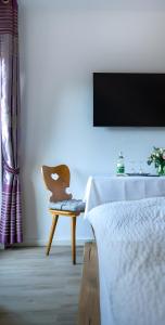 TV a/nebo společenská místnost v ubytování Pension Haus Monika + 20 fotografií