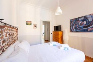 Postel nebo postele na pokoji v ubytování Belle Arti Zen Apartment- Cale 03 + 55 fotografií