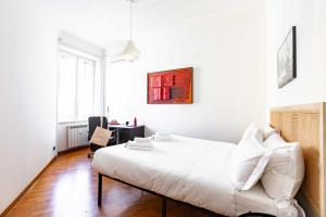 Postel nebo postele na pokoji v ubytování Belle Arti Zen Apartment- Cale 03